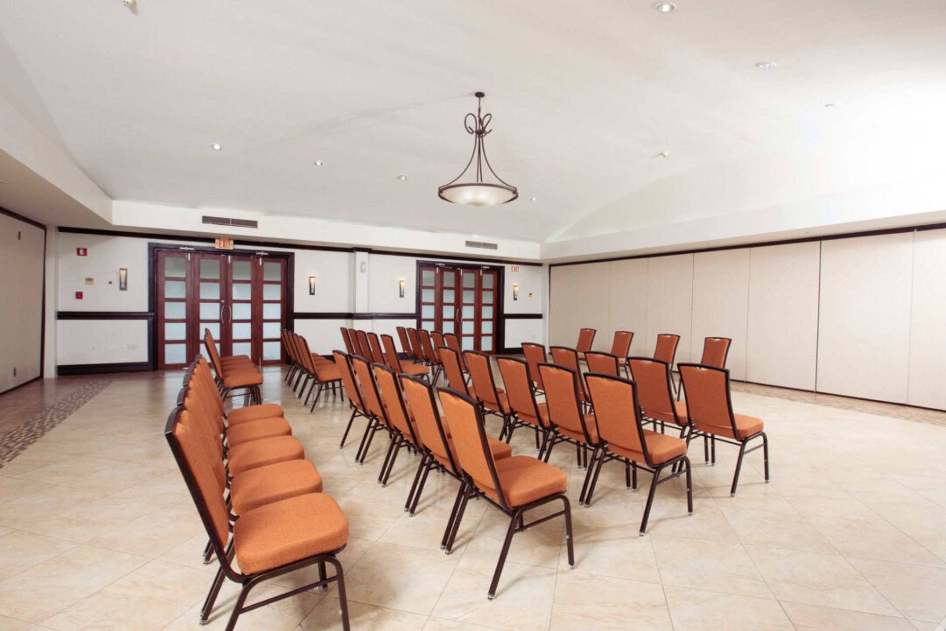 A room with tables and chairs