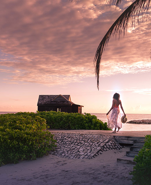 A woman walking on a beach