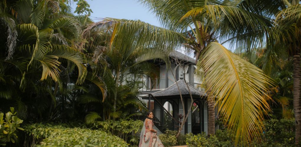 bride outside with palm trees