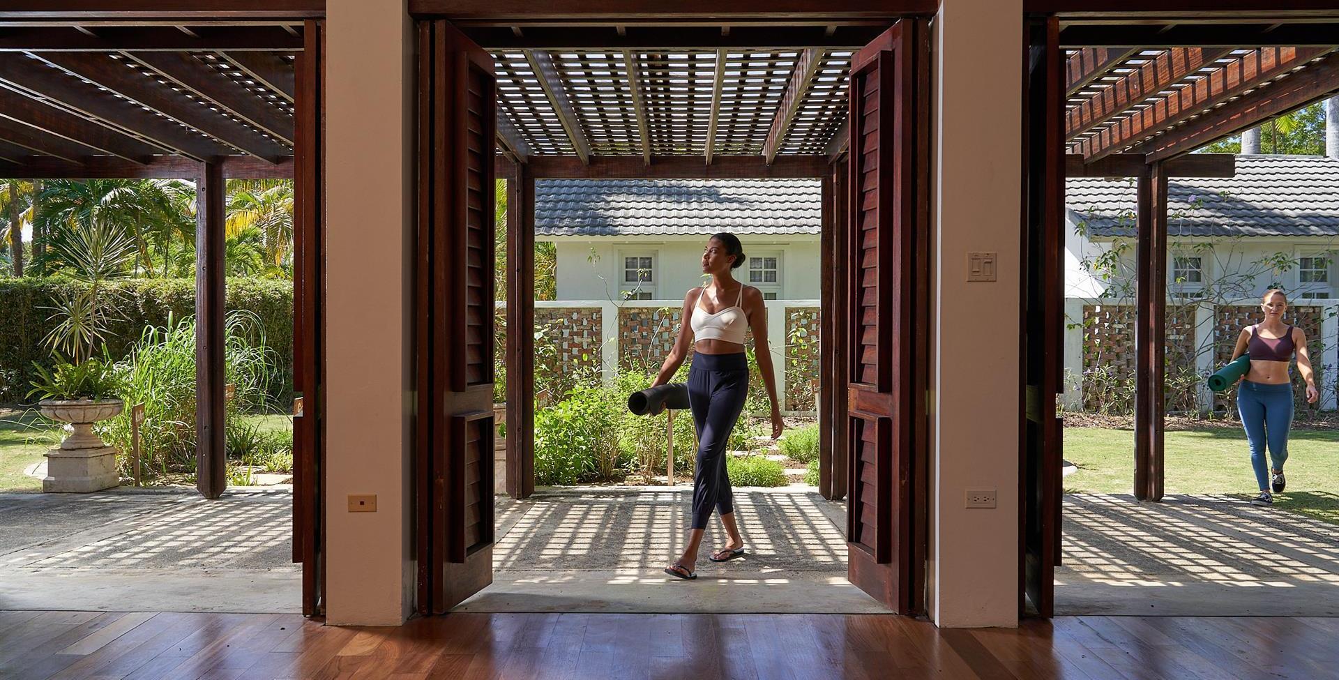 A woman walking in a doorway