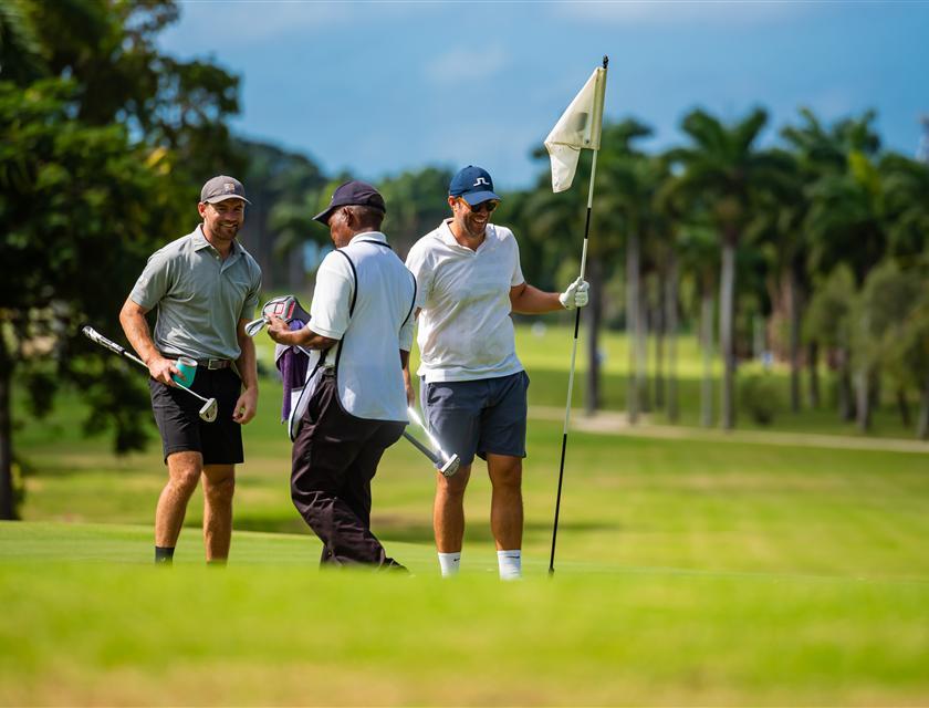 A group of men on a golf course